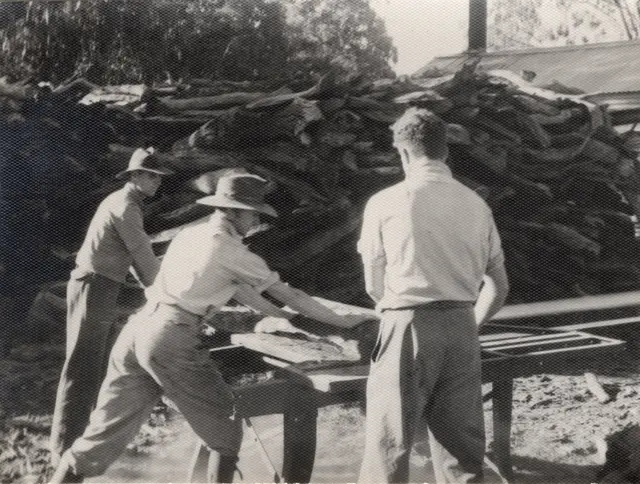 Hughie, Bill McBratney and George at the woodsaw bench, 1948