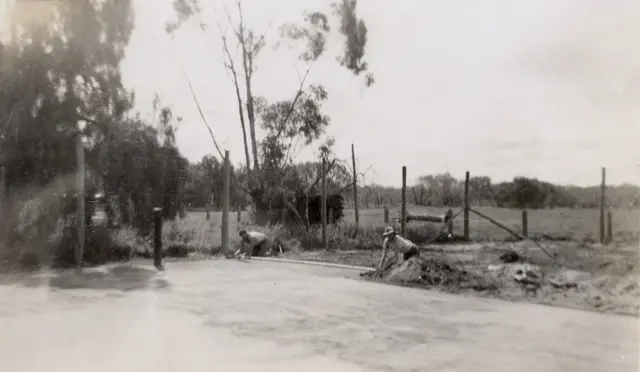George and Bill McBratney rebuilding the tennis court, 1948