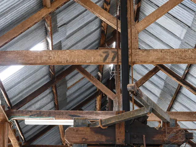 Stencilled 77 in the shed rafters